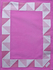 Patchworkdecke rosa mit Applikation Geometrie